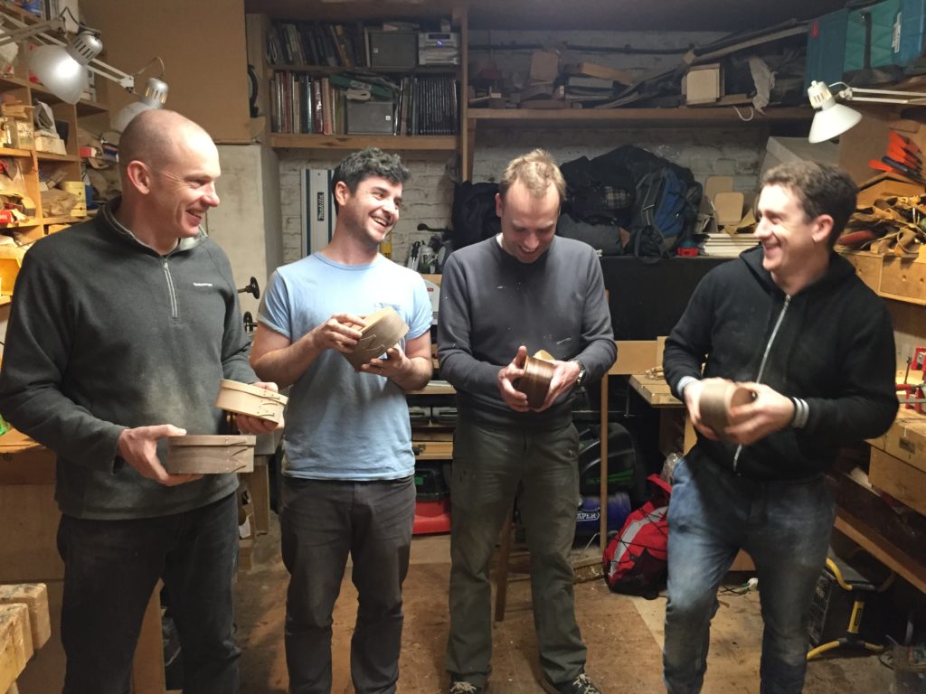 Students on the oval box class with some of their finished boxes